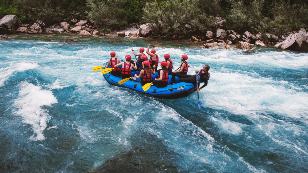 rowing across a river with a current
